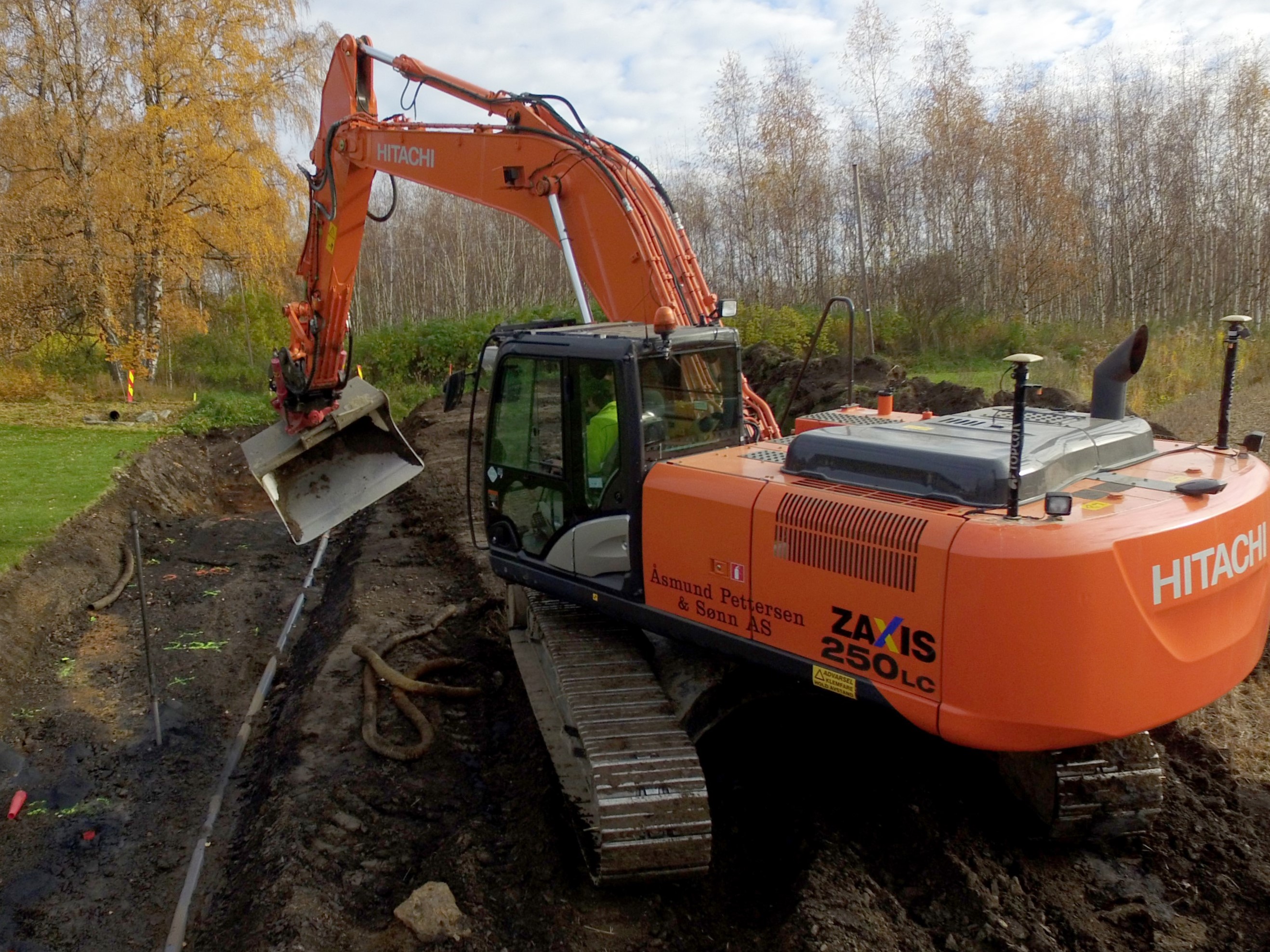 Gravemaskin med CPOS