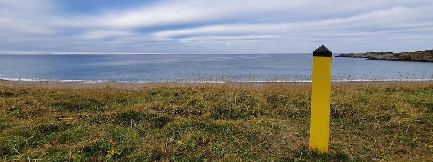 Utsikt ut mot havet fra Grense Jakobselv i Sør-Varanger i Finnmark. Foto: Steinar Ittelin, Kartverket